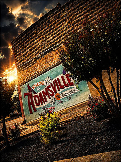 Picture of Building with Welcome to Adamsville, TN Sign 